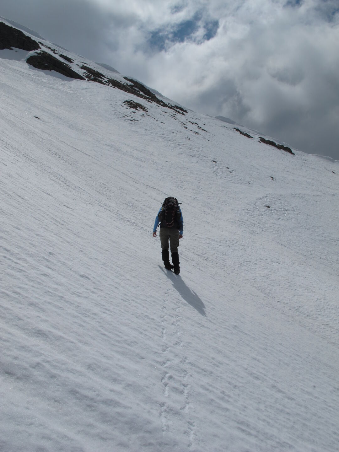 Crossing the North Wall -- crampons did come in handy (or footy?) here!