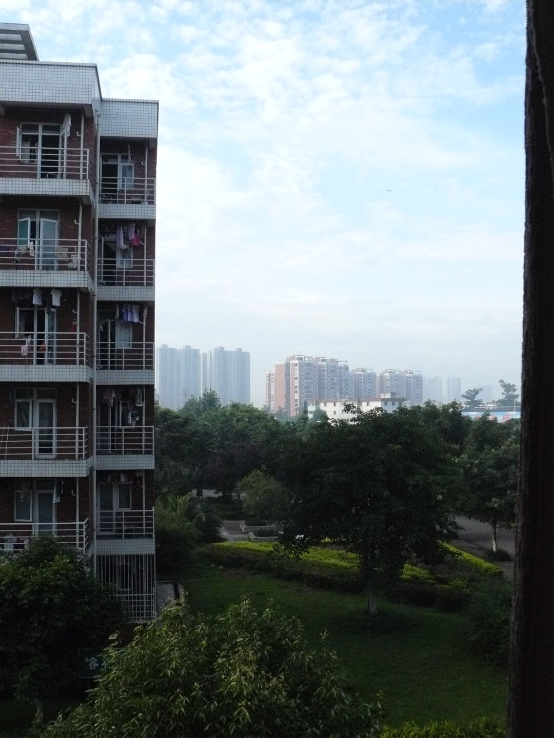 View from the window of my living room. The building on the left is the other end of the u-shaped guesthouse.