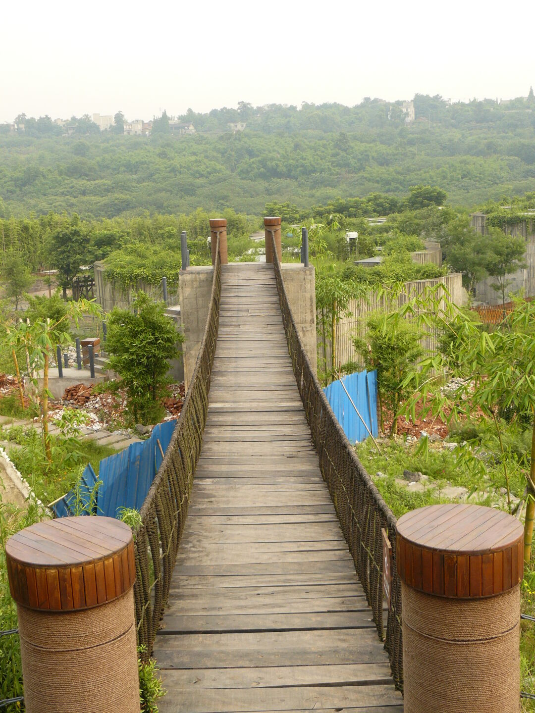 Cross the suspension bridge carefully - no swinging! You wouldn&rsquo;t try anything if you saw the state of the planks and the steel cables.